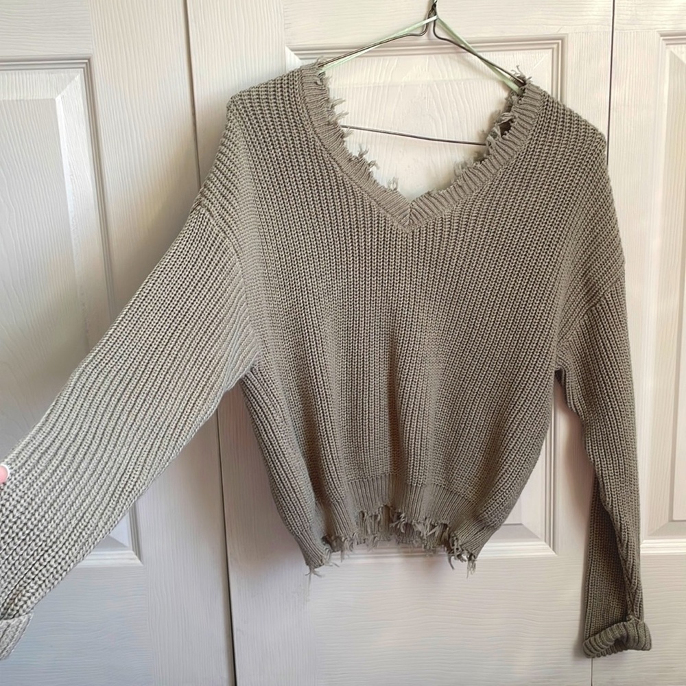 Jessica Simpson green sweater. Distressed collar and Hem line.